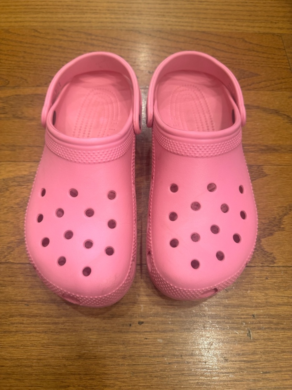CROCS adults Pink Classic Clog w/ Heel Strap. Men’s size 9, women’s size 11.